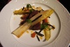 Foie gras de canard cuit  au four et caramélisé,  truffes noires, pamplemousse et endive